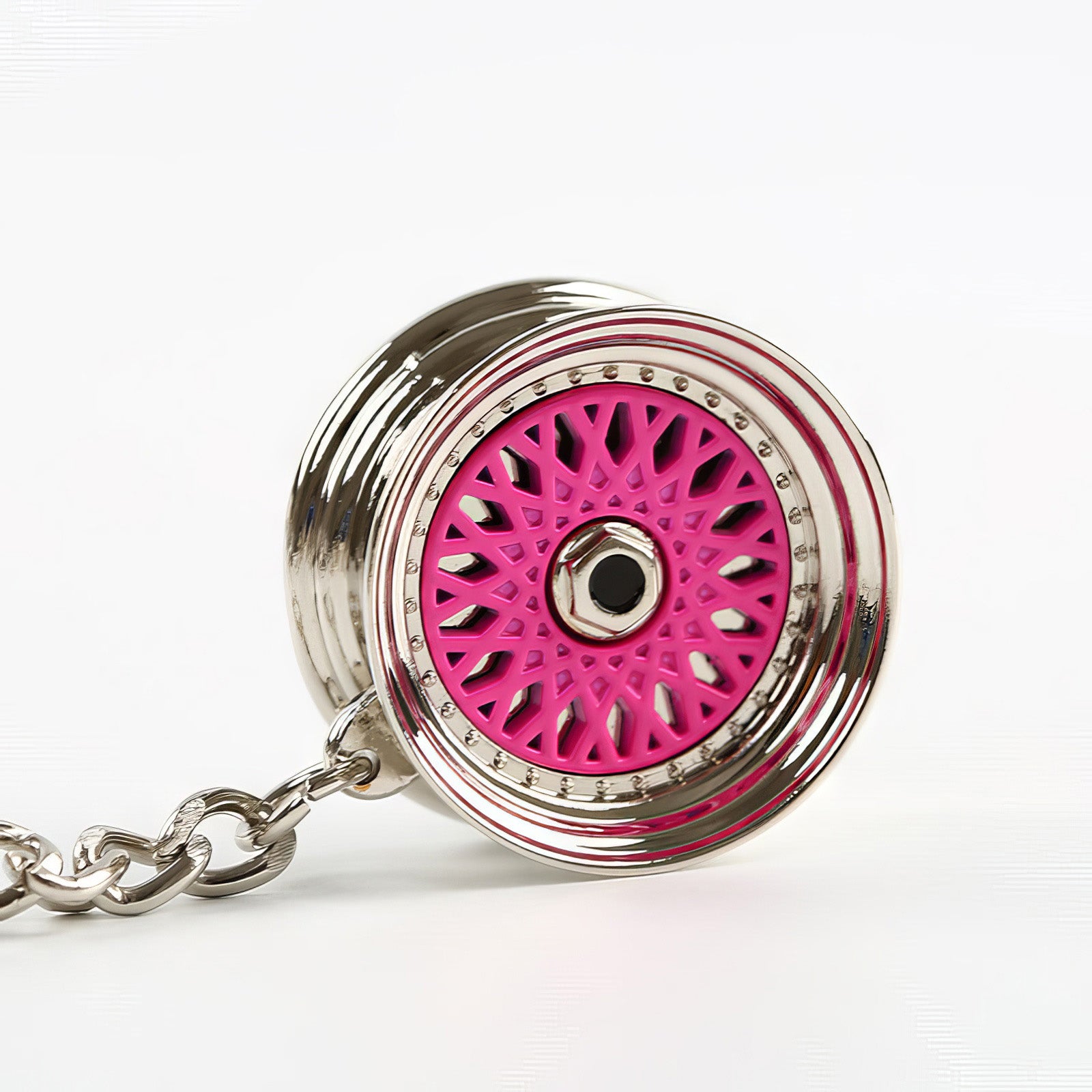 BBS Mesh Wheel keychain with pink center.