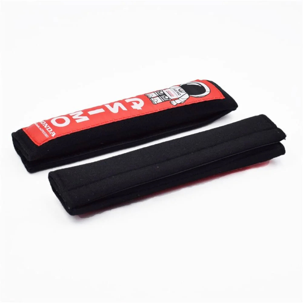 Honda ASIMO robot seat belt shoulder pads in black.