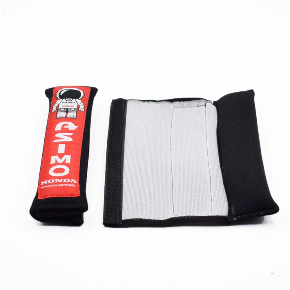 Honda ASIMO robot seat belt shoulder pads in black.