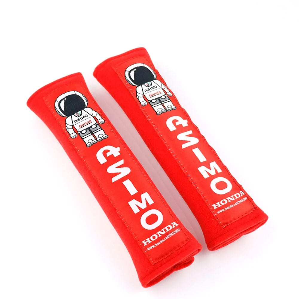 Honda ASIMO robot seat belt shoulder pads in red.