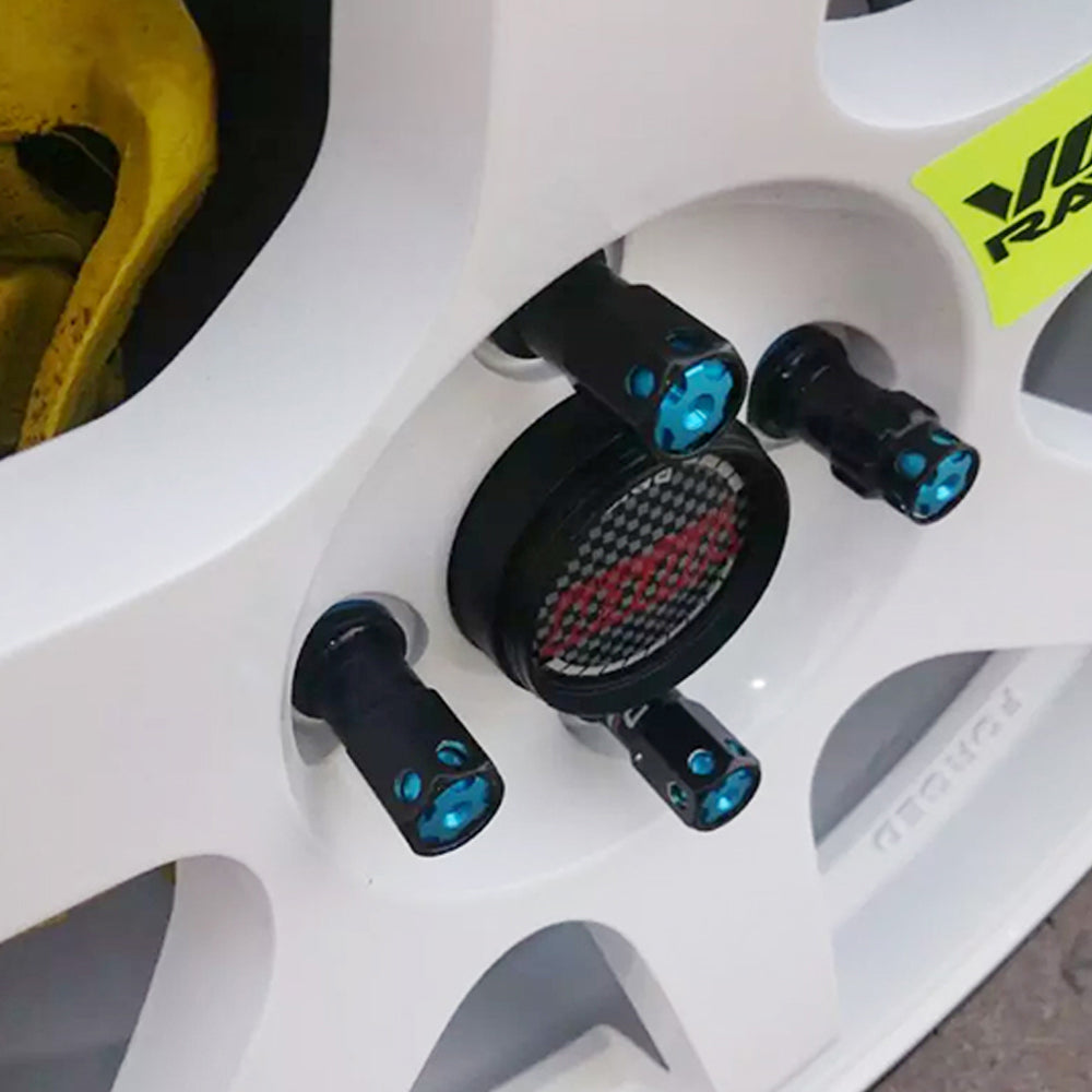MaxGuard R40 Style Racing Lug Nuts in mounted on wheels.