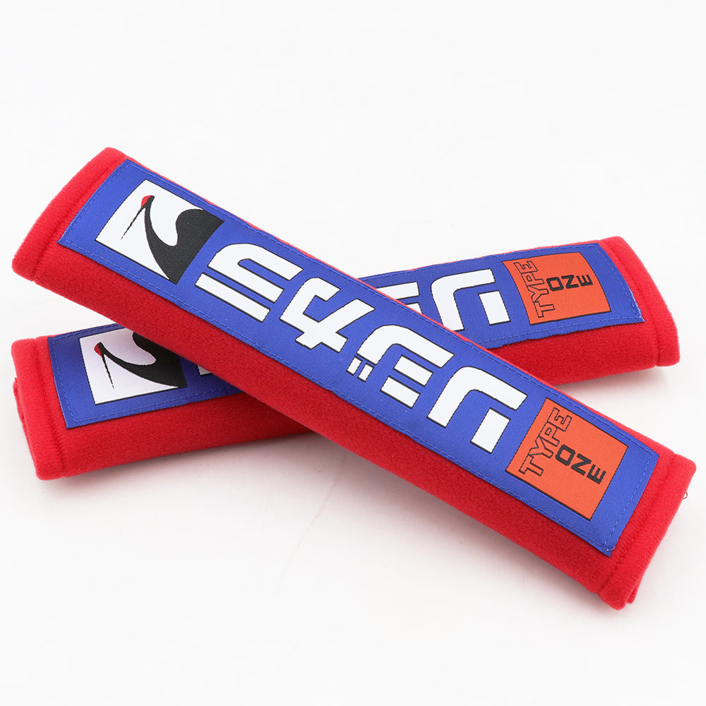 Spoon Sports seat belt shoulder pads in red.