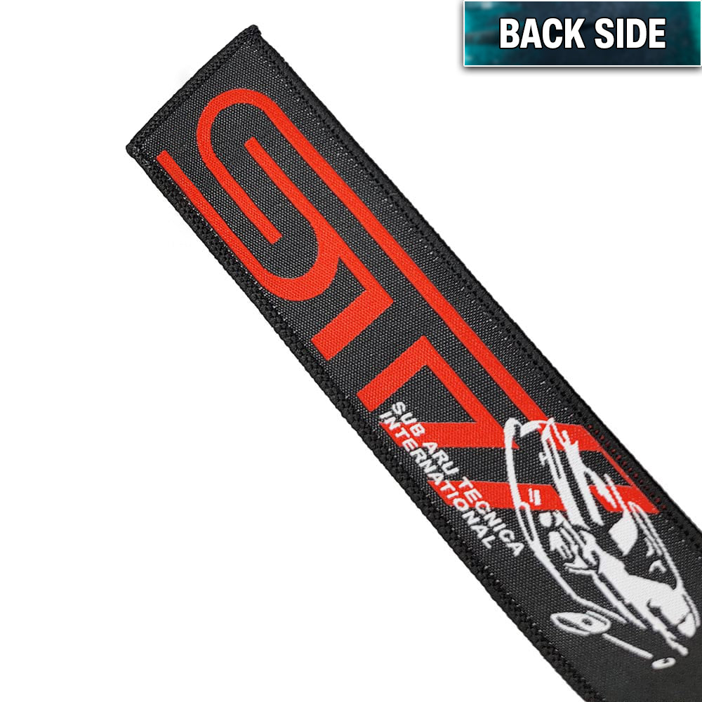 STI Rising Sun Jet Tag with keychain ring.