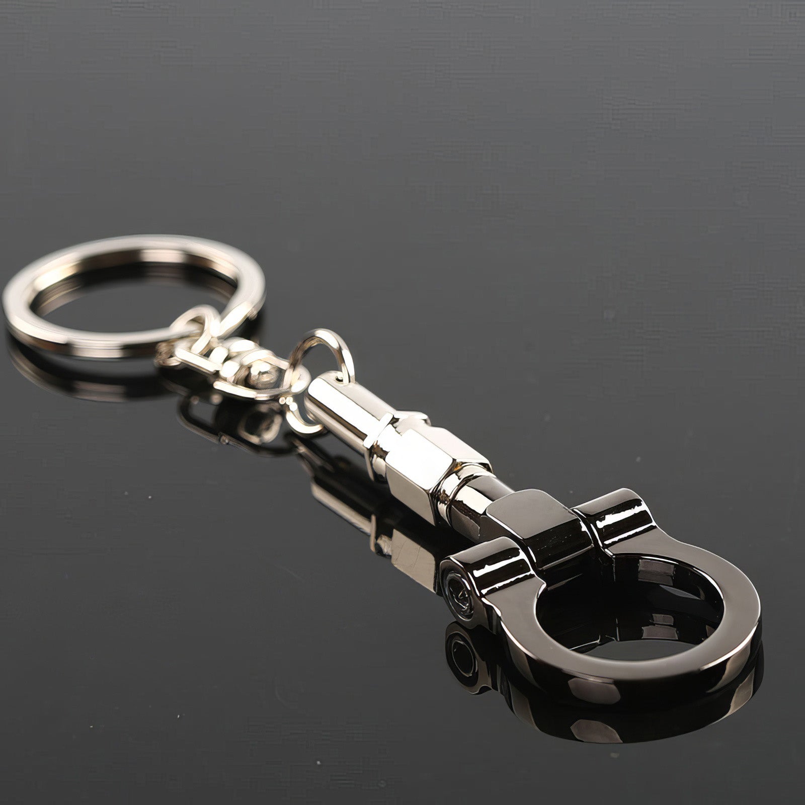 Tow hook keychain with black hook.