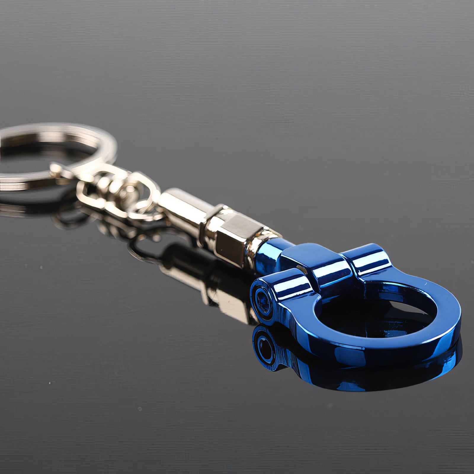 Tow hook keychain with blue hook.