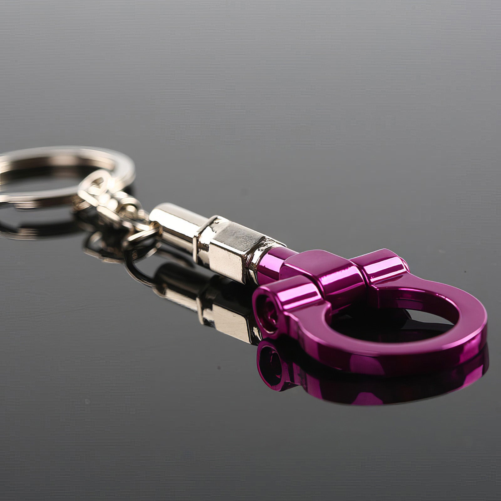 Tow hook keychain with purple hook.