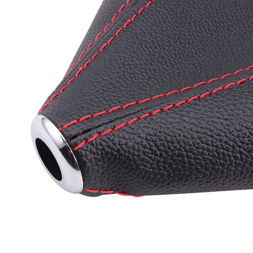 Black universal leather gear shift boot cover with red stitching.