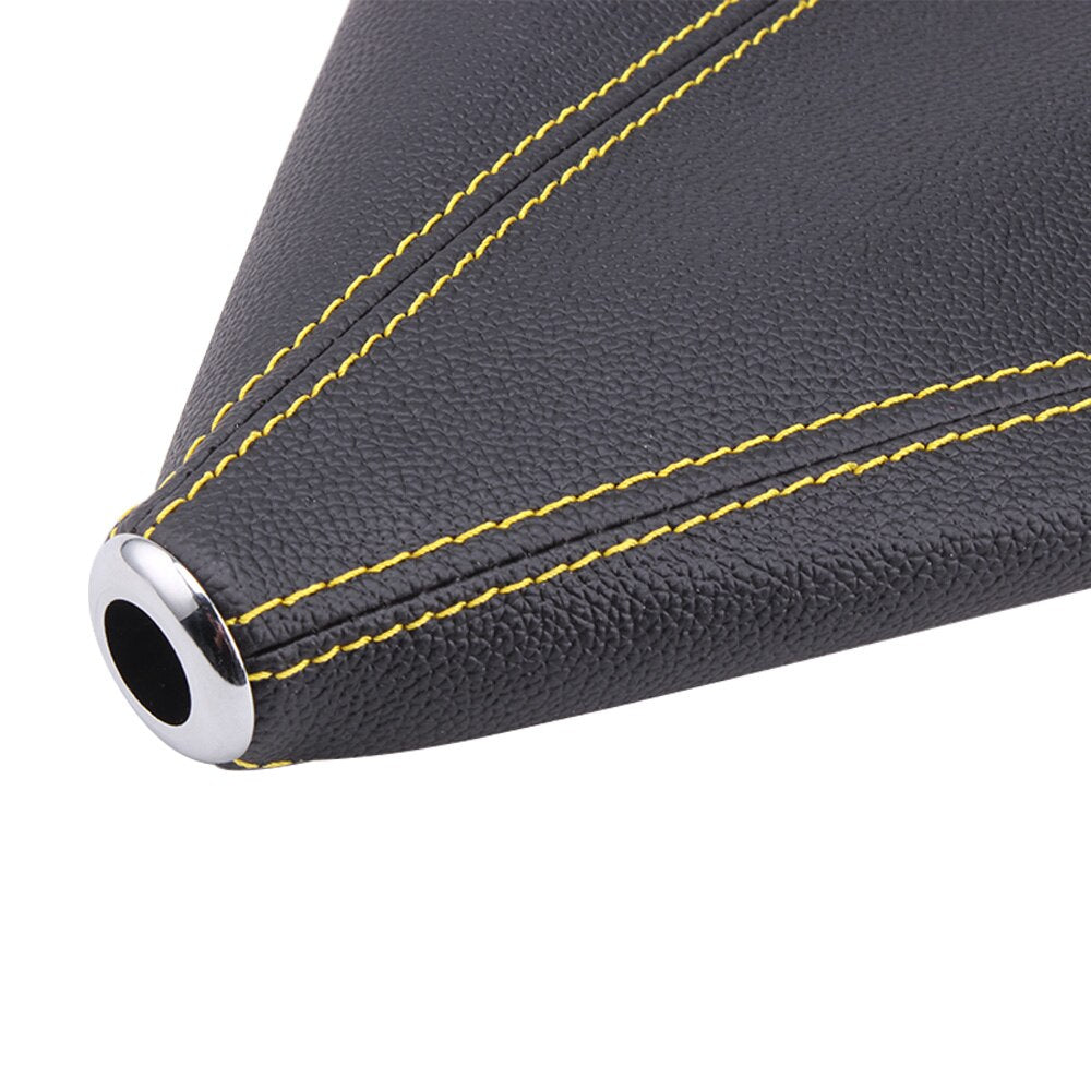 Black universal leather gear shift boot cover with yellow stitching.
