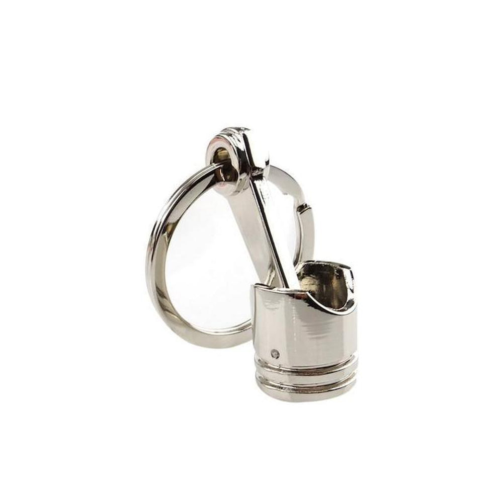 Big piston car keychain in silver.