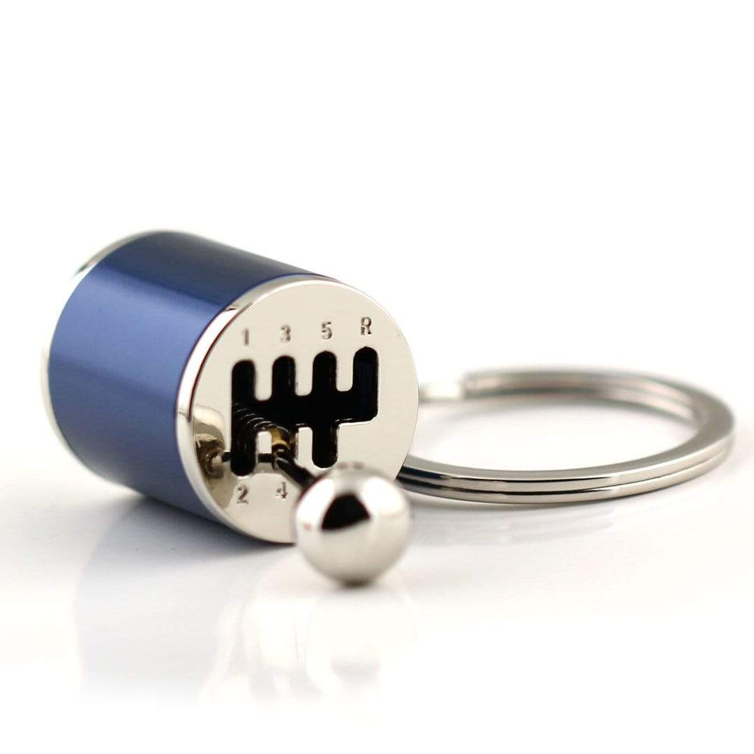 Gear stick shift car keychain in blue.