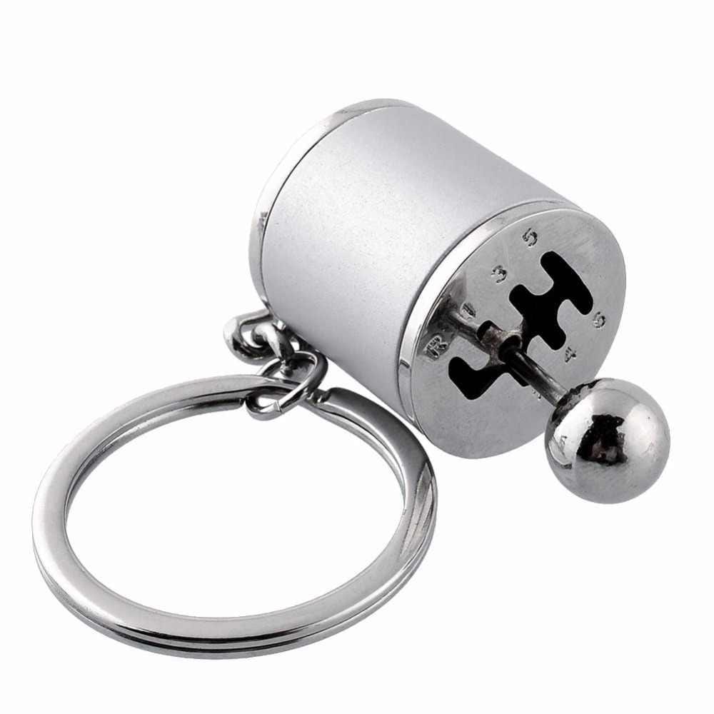 Gear stick shift car keychain in silver.