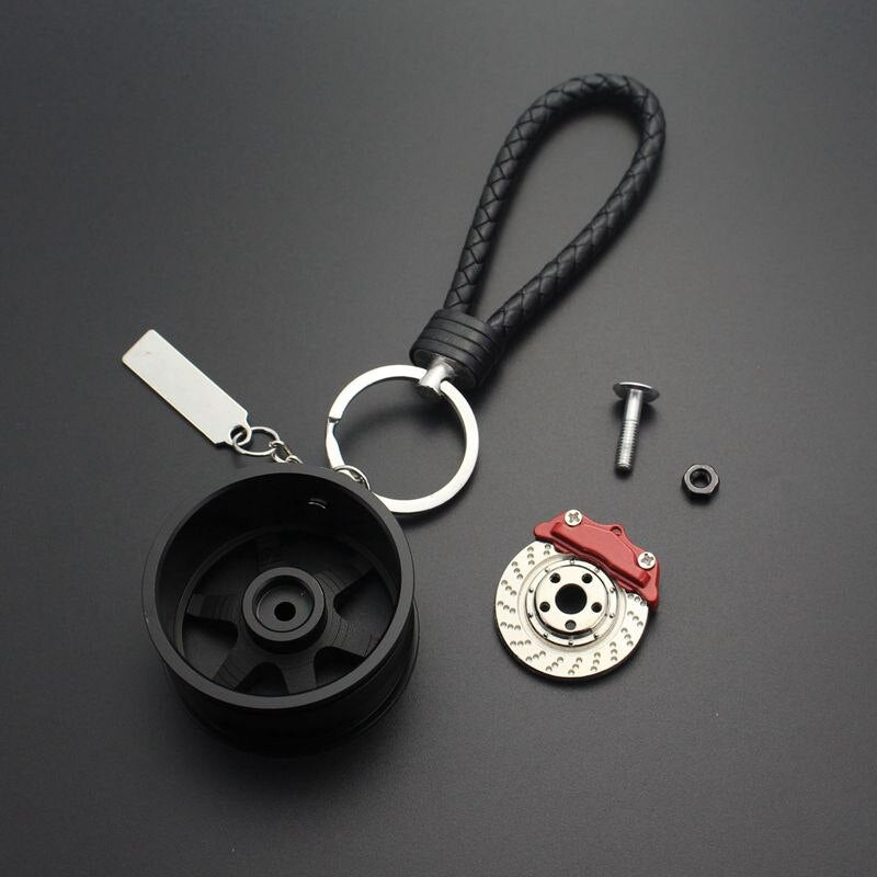 TE37 RAYS wheel with disc brake car keychain in black.
