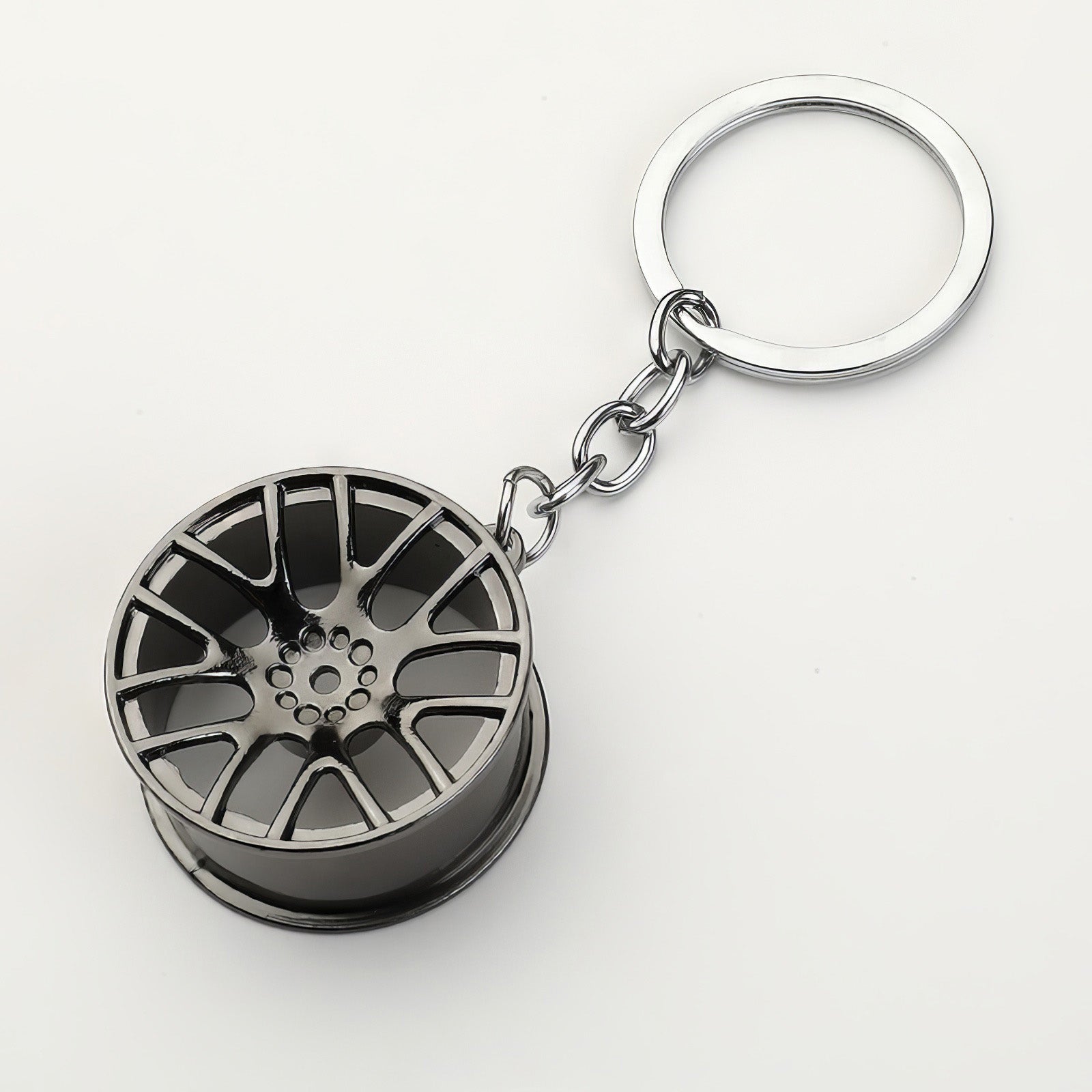 Concave wheel keychain in black.