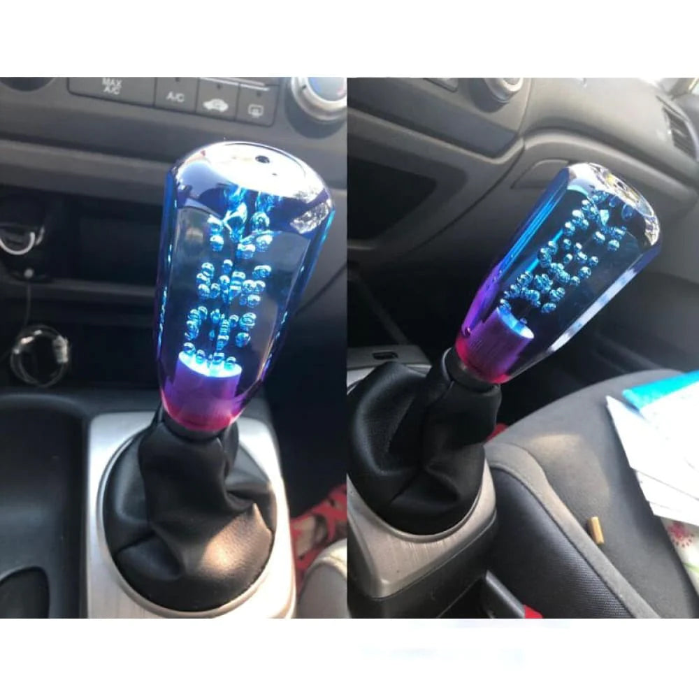 JDM bubble gear shift knob in 10cm length with blue and purple color installed in car.