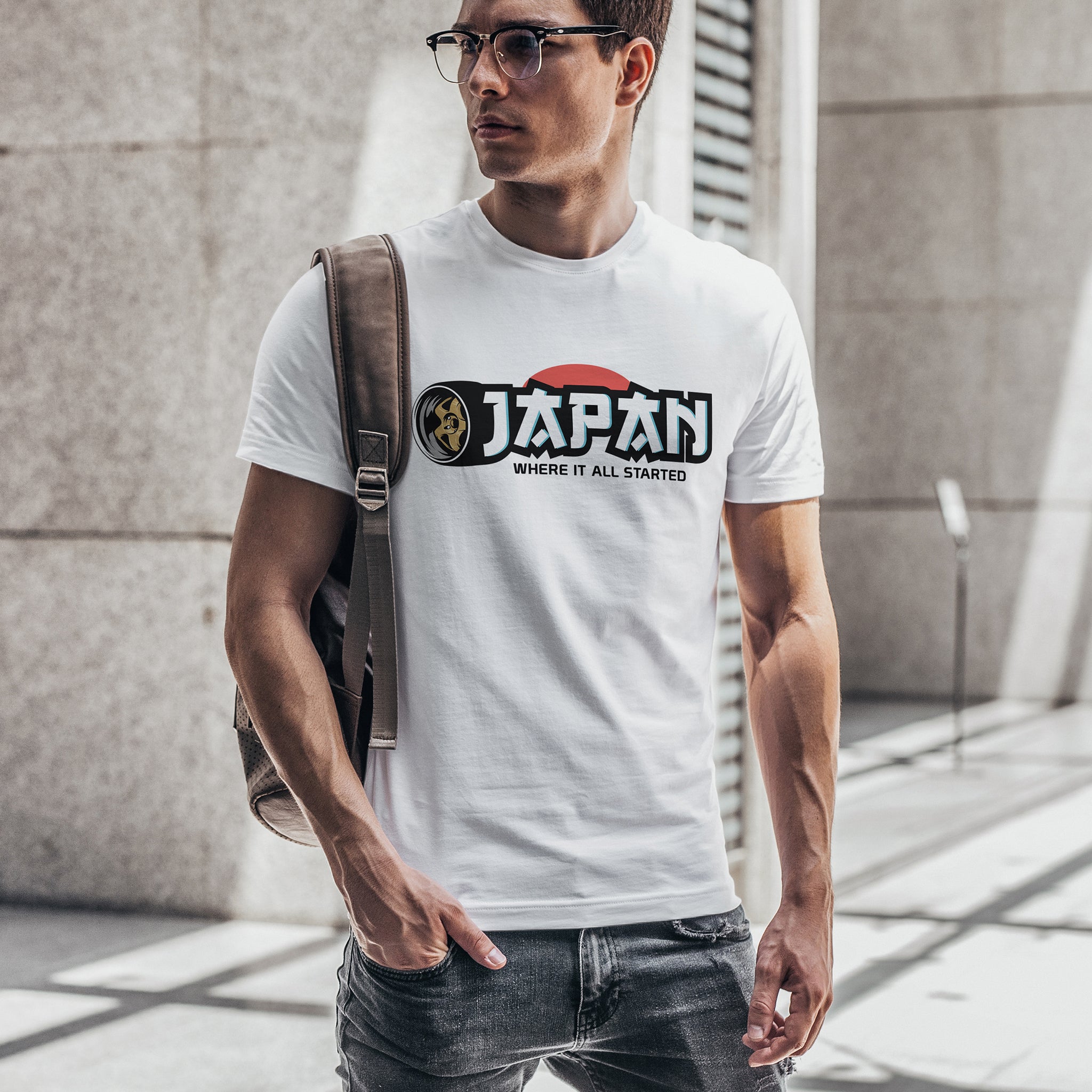 Man wearing "Japan - Where It All Started" car t-shirt in white.