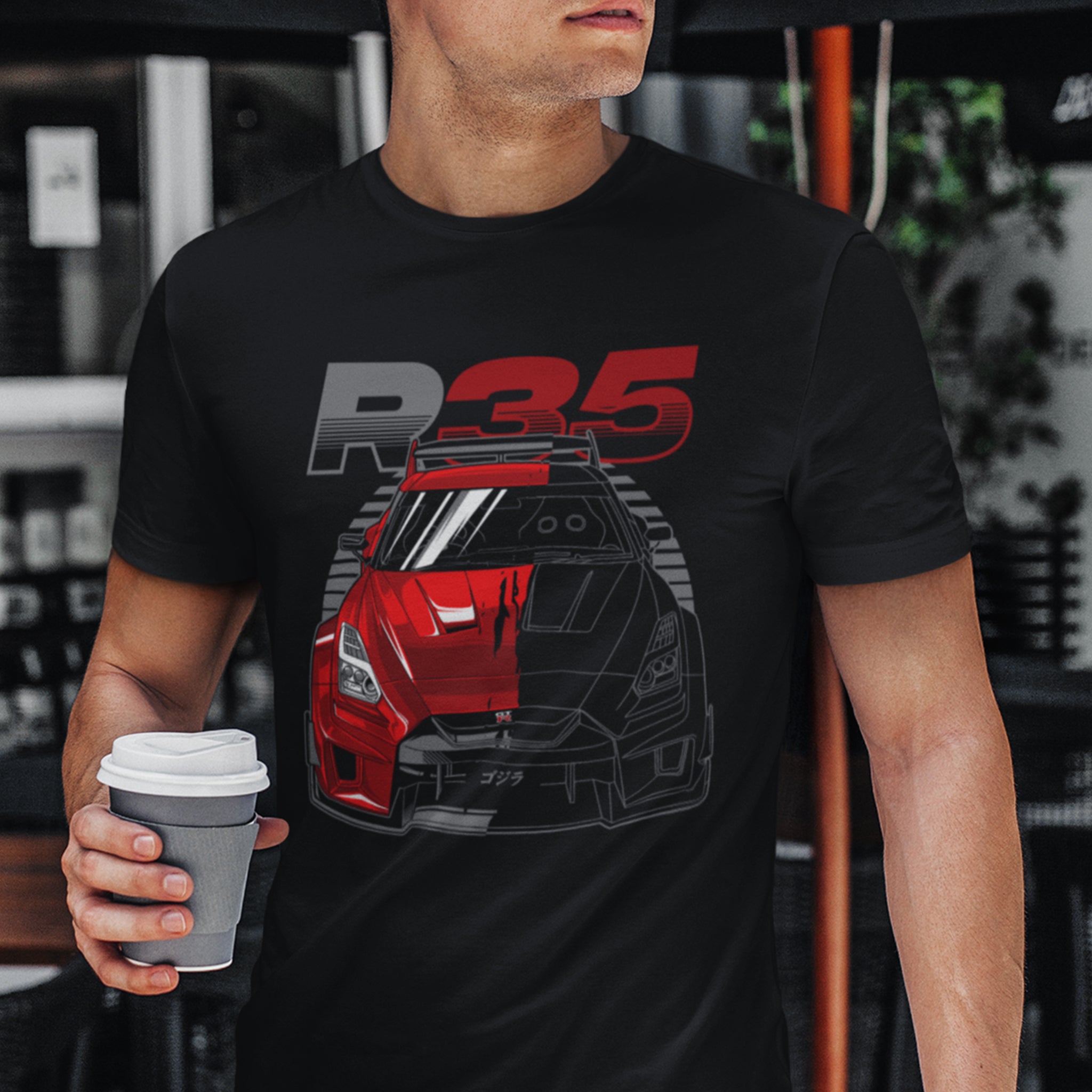 Man wearing Nissan Skyline GTR R35 Liberty Walk Car T-Shirt in black.