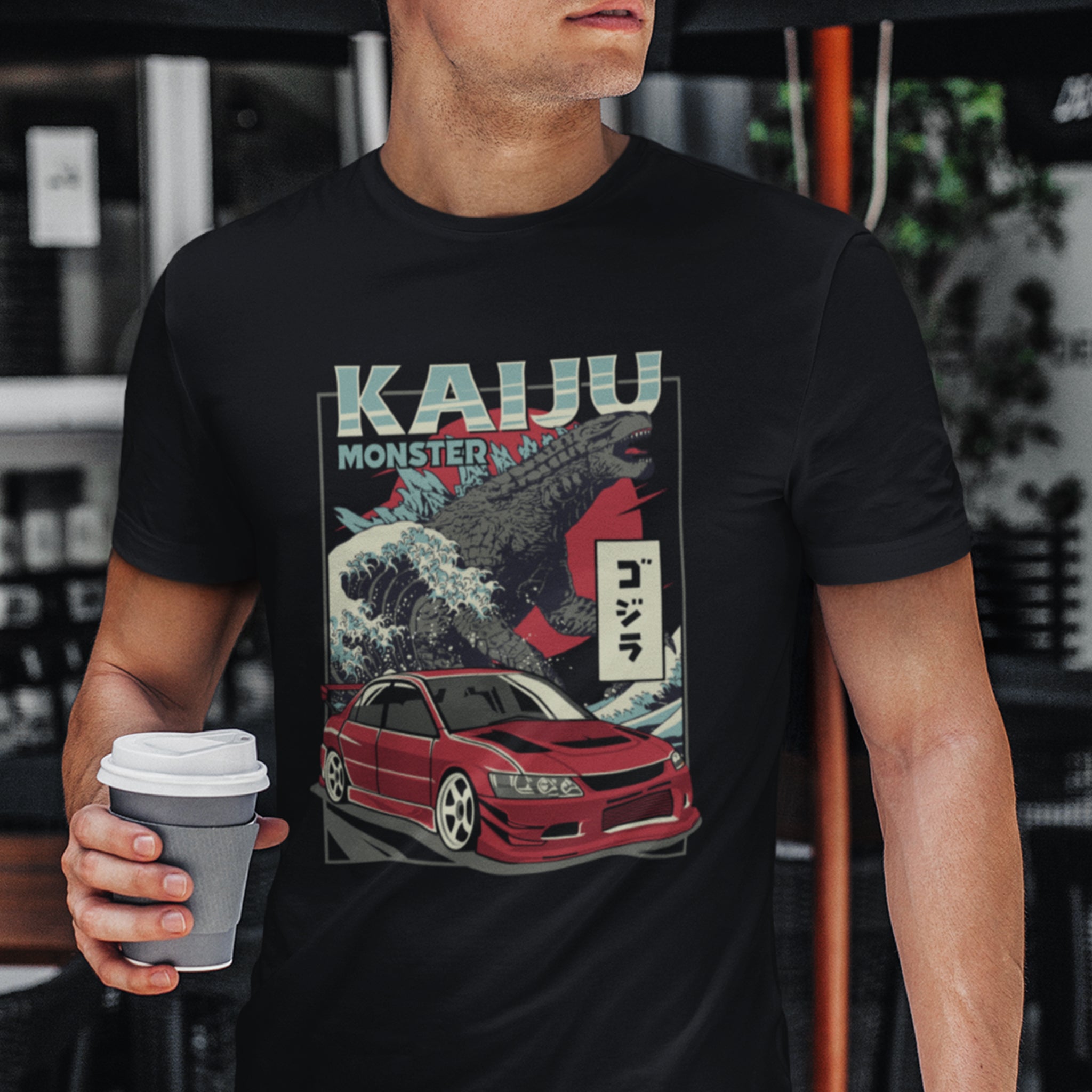 Man wearing Mitsubishi Lancer Evolution Kaiju Car T-Shirt in black.