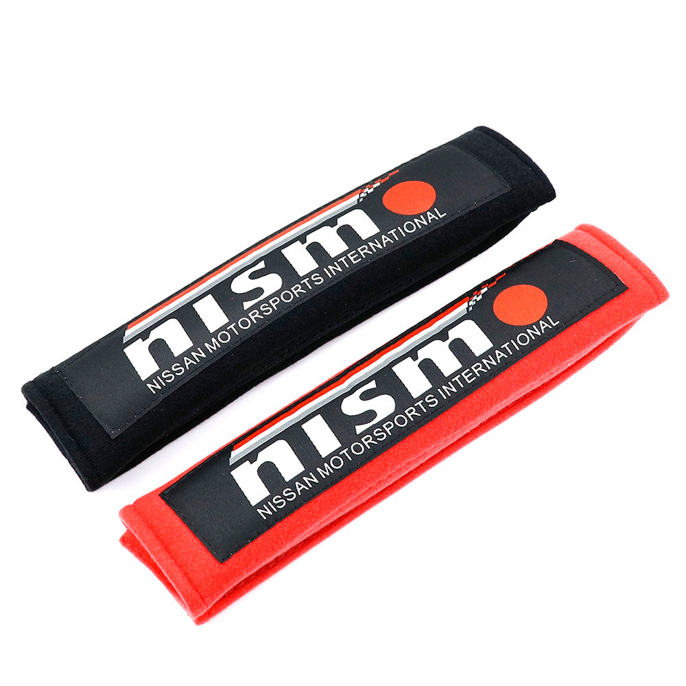 Nissan NISMO racing seat belt shoulder pads in black and red.