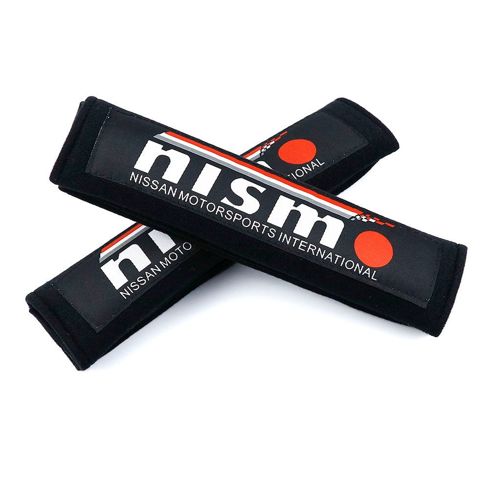 Nissan NISMO racing seat belt shoulder pads in black.
