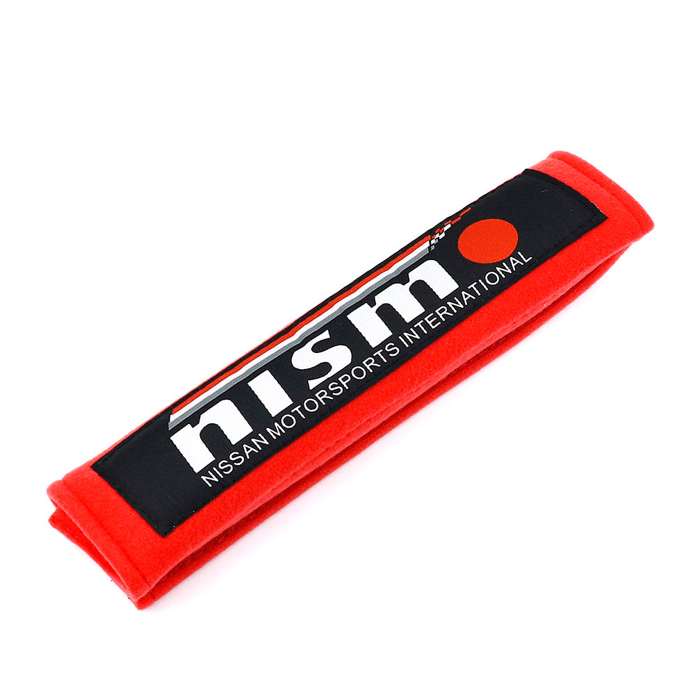 Nissan NISMO racing seat belt shoulder pads in red.