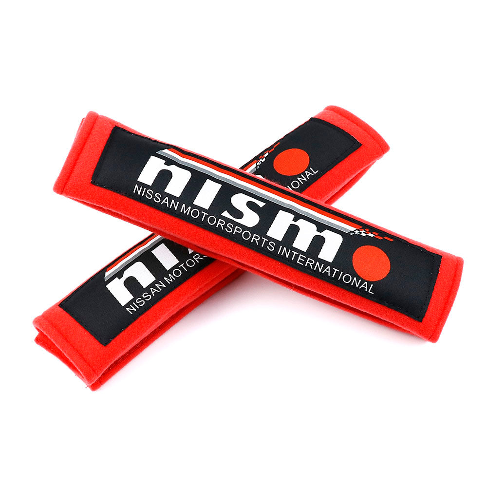 Nissan NISMO racing seat belt shoulder pads in red.