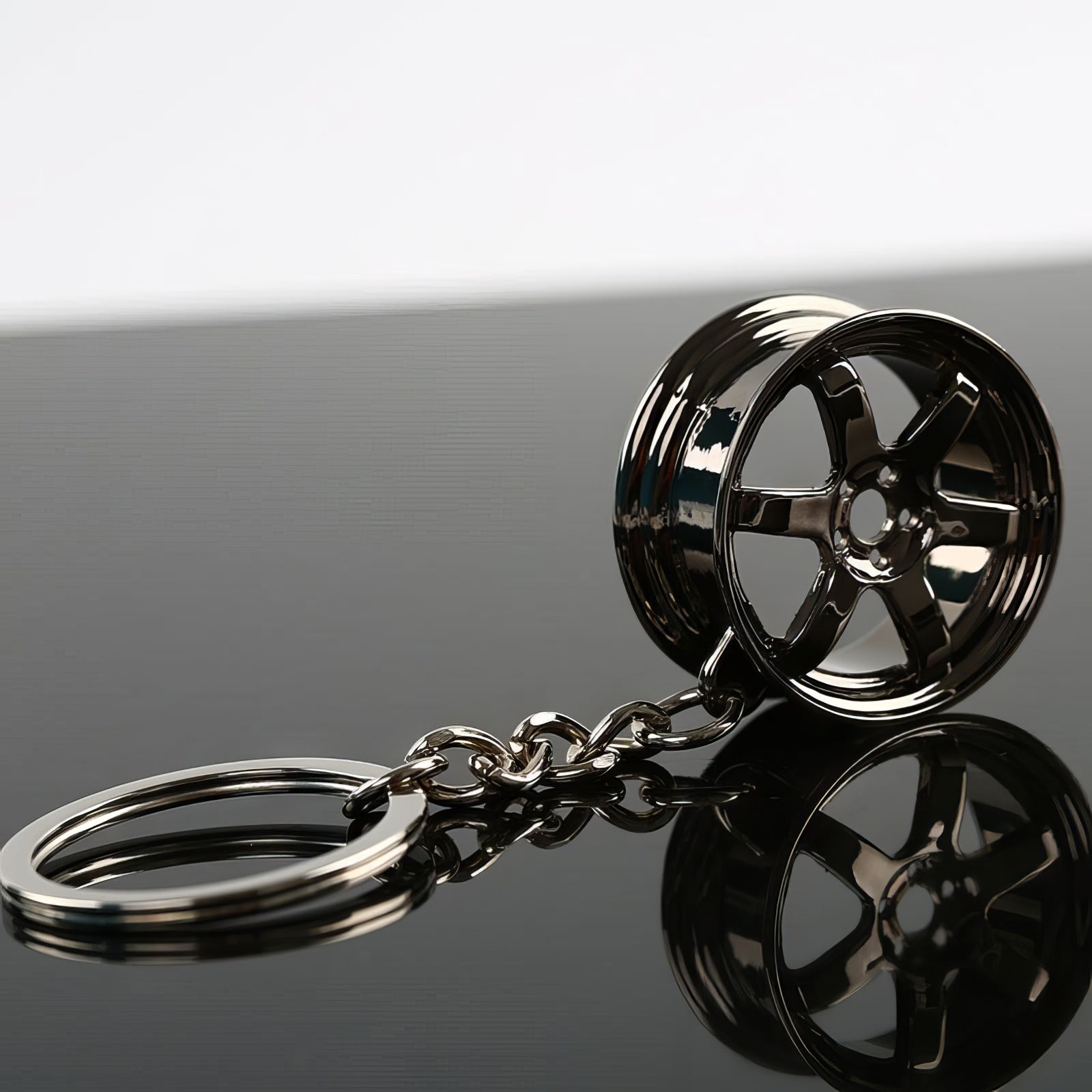 RAYS TE37 Wheel Keychain in black.