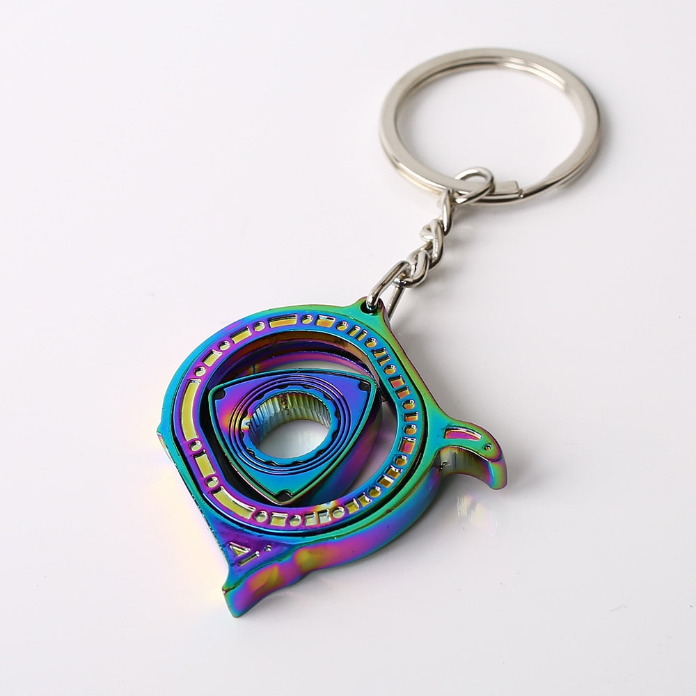Spinning Rotary Engine Keychain in neochrome.