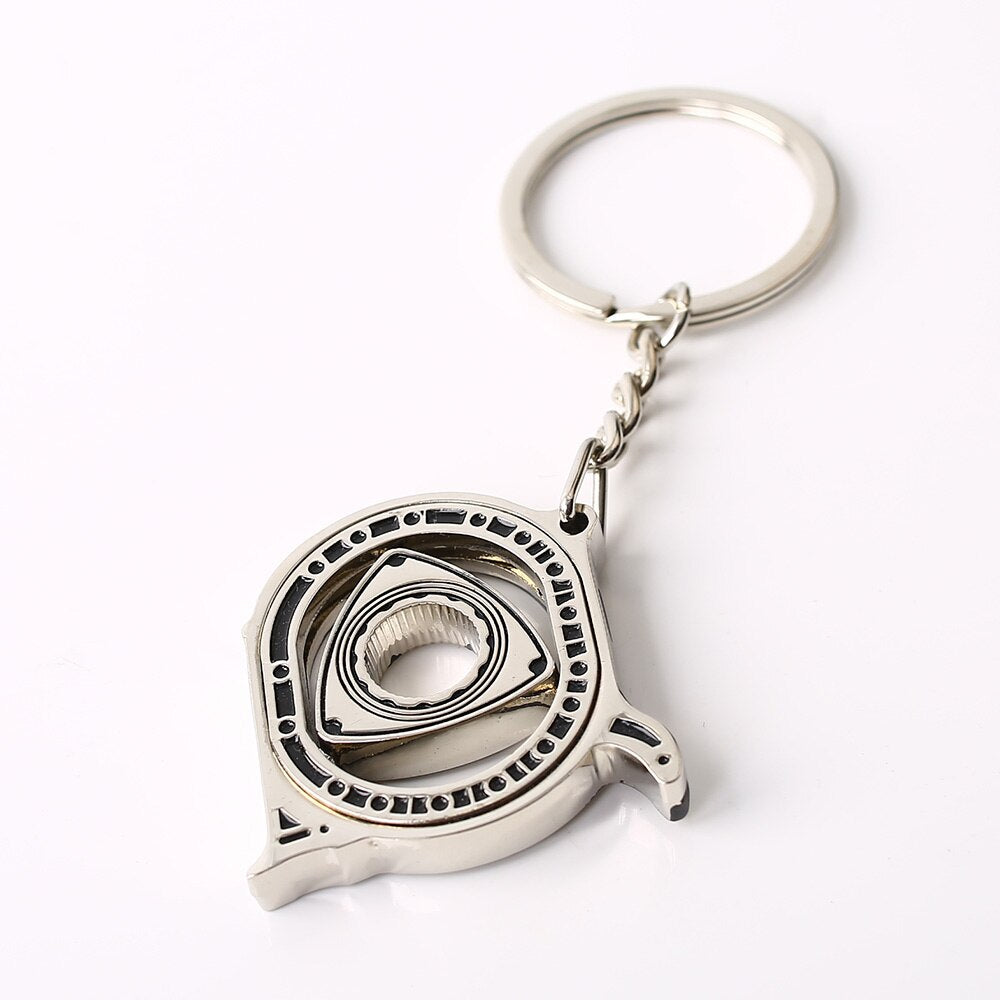 Spinning Rotary Engine Keychain in silver.