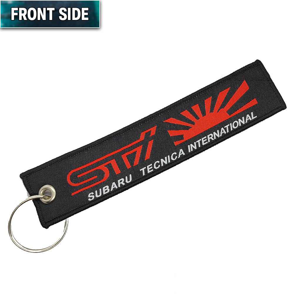 STI Rising Sun Jet Tag with keychain ring.