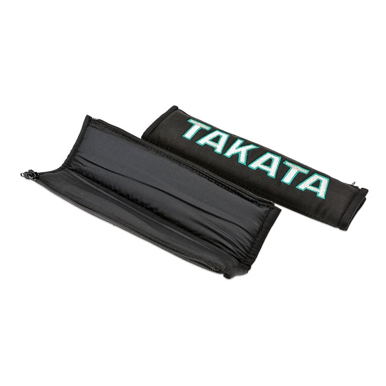 A pair of Takata comfort seat belt shoulder pads in black.