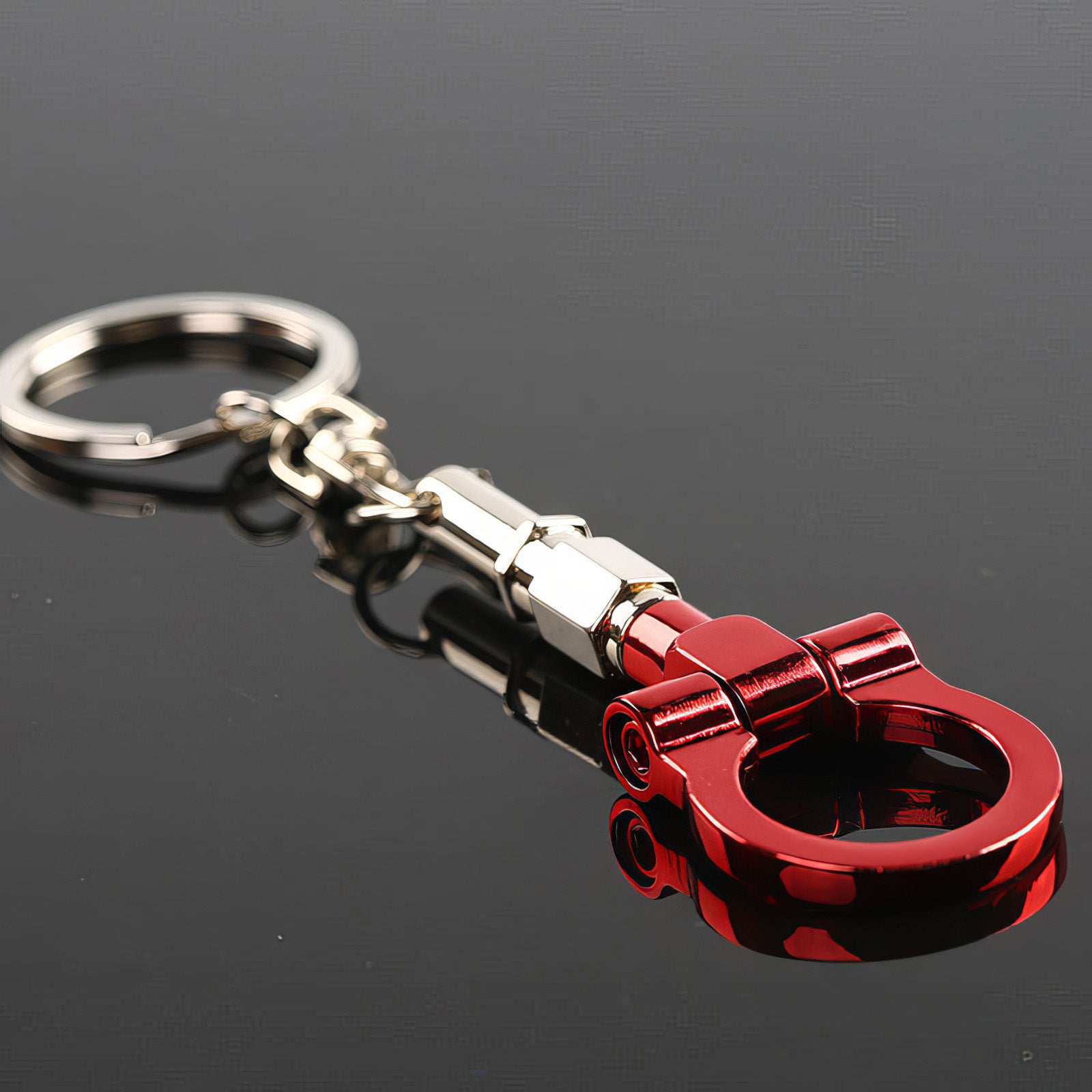 Tow hook keychain with red hook.