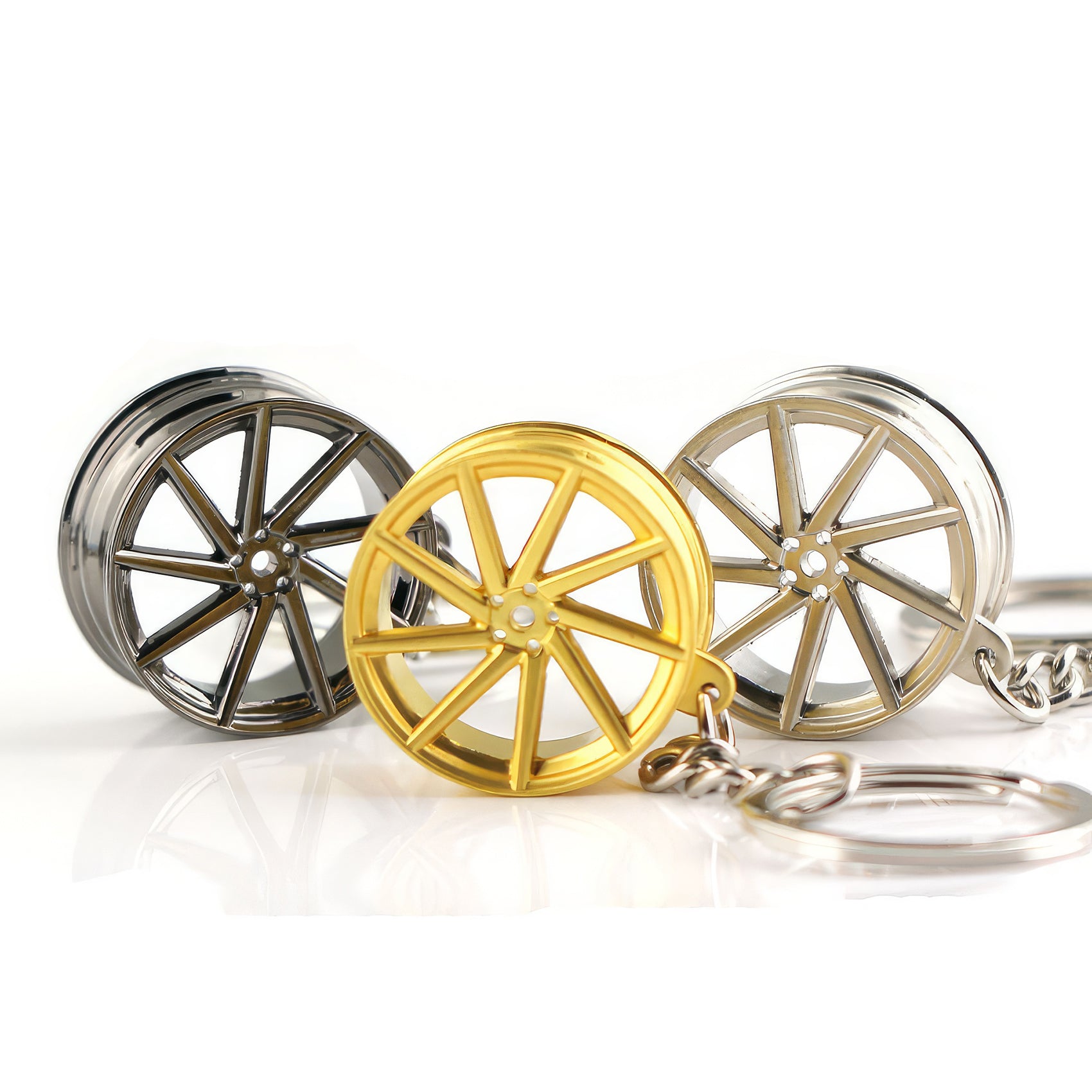 Vossen CVT Car Keychain in black, gold, and silver.