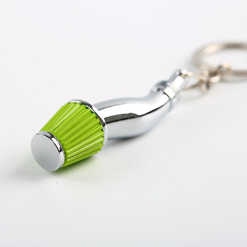 Cold Air Intake Keychain in green.