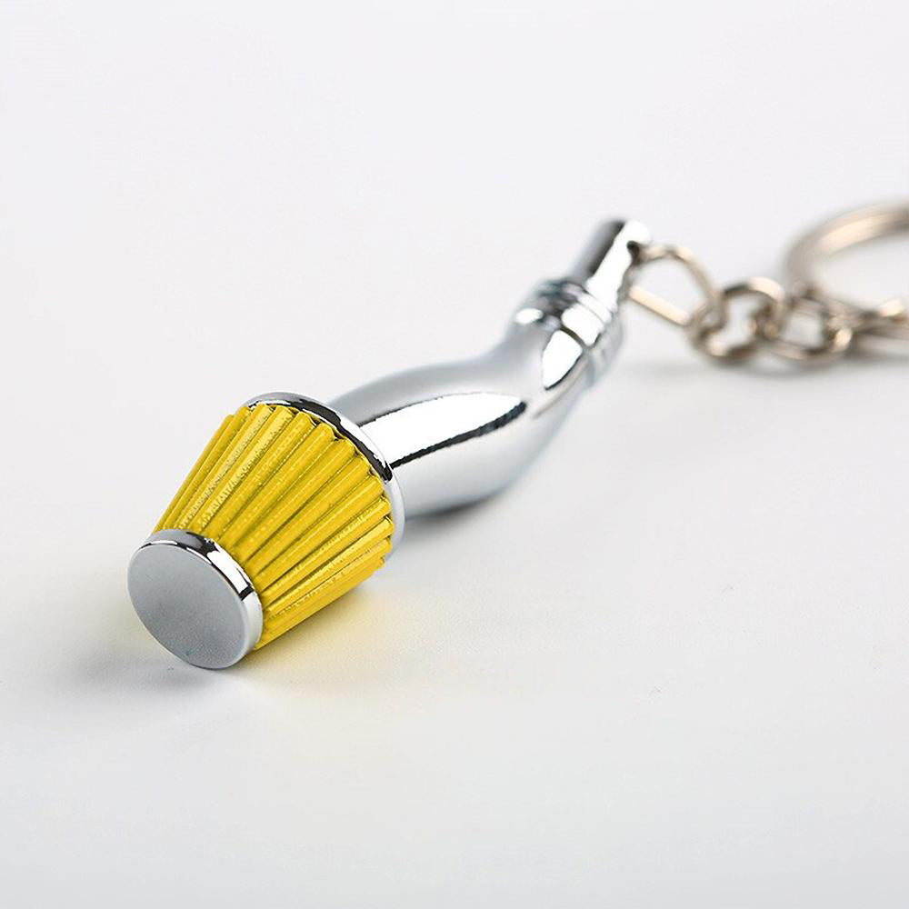 Cold Air Intake Keychain in yellow.