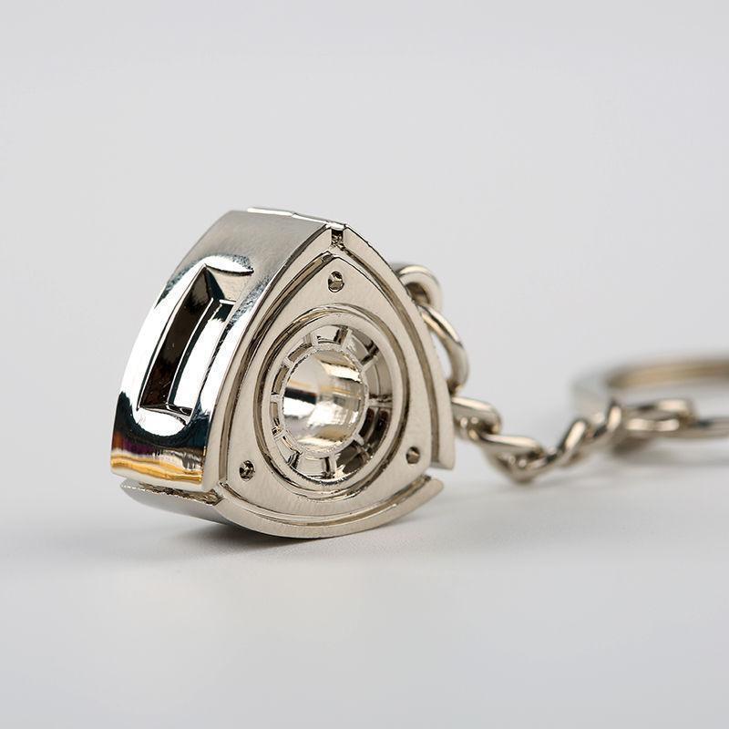 Rotary engine centerpiece car keychain in silver.
