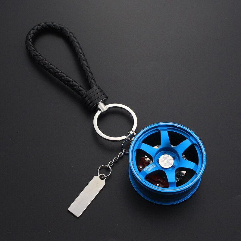 TE37 RAYS wheel with disc brake car keychain in blue.