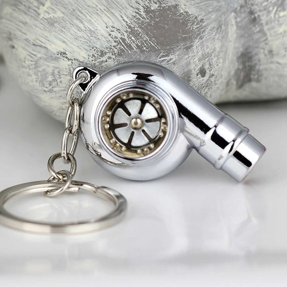 Turbocharger whistle car keychain in silver.