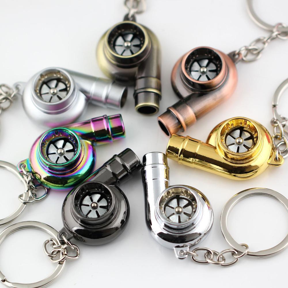 Turbocharger whistle car keychain in black, neochrome, matte silver, silver, gold, and copper.